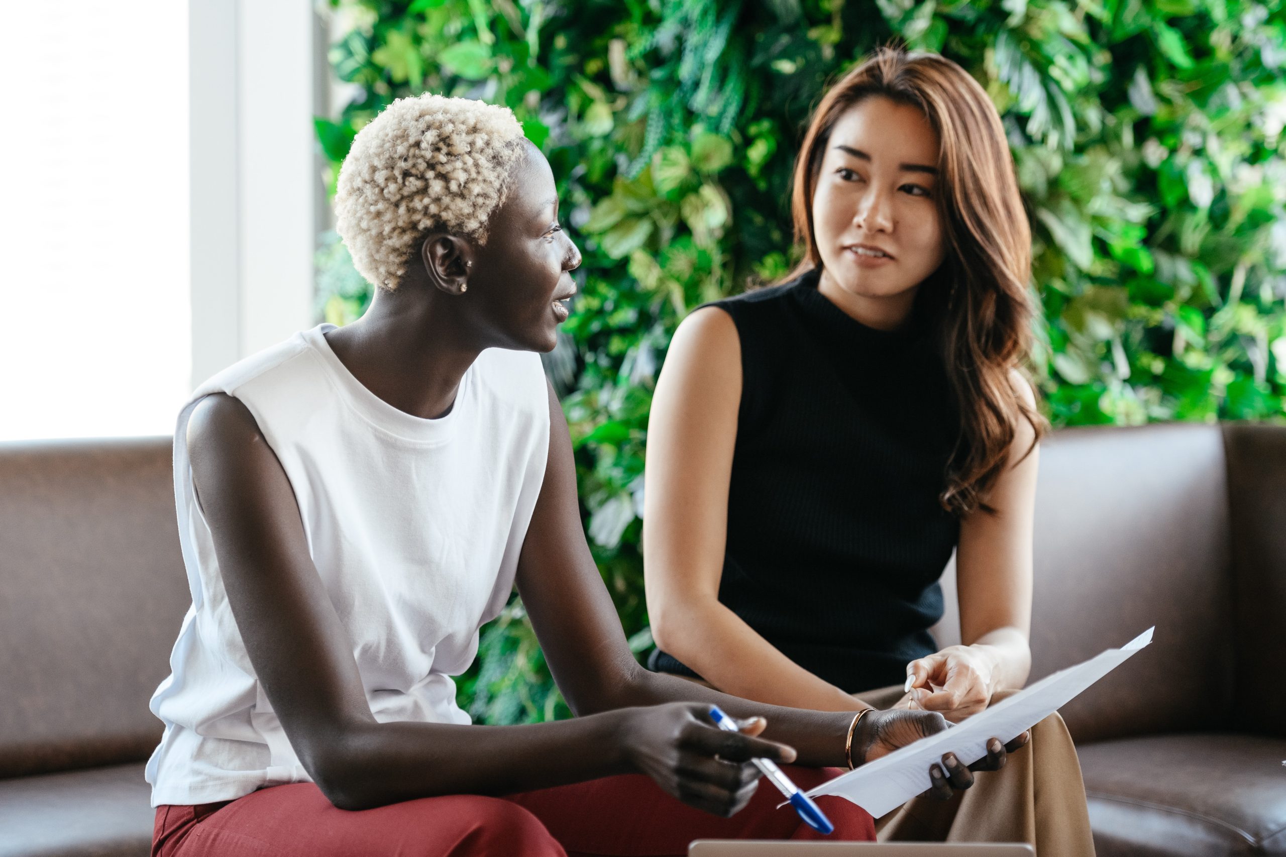 Two physiotherapists discussing their options concerning exams