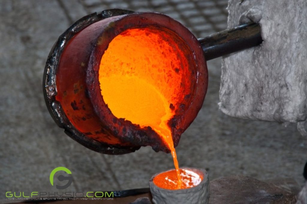 Molten metal is poured into a cast that was once made with paraffin wax