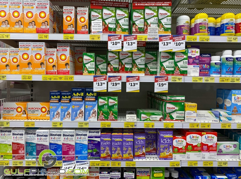 A pharmacy shelf stocked with medication for children.